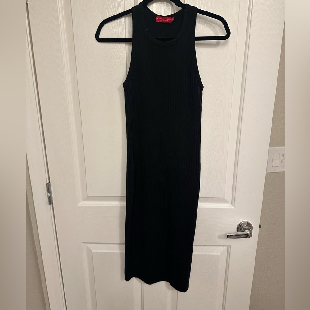 Philanthropy midsize racer back dress. In new condition no flaws.